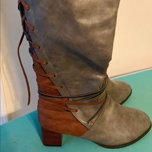 Knee high tie up boots